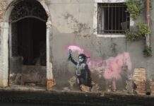Il migrante salvato dalle acque Banksy-Magazine