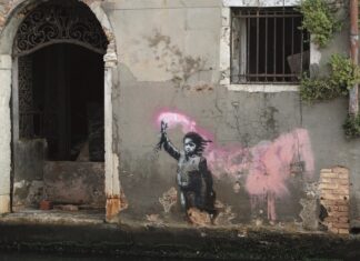 Il migrante salvato dalle acque Banksy-Magazine