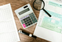 Recupero fiscale 2025 da record scrivania con documenti fiscali